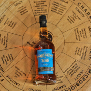 Bottle of Daviess County Kentucky straight bourbon whiskey on a flavor wheel